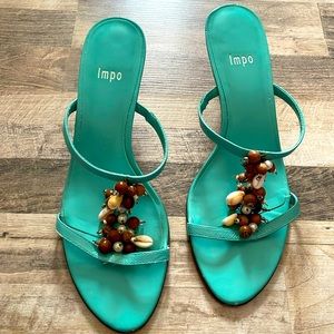 Turquoise Sandals with shell details